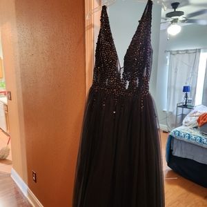 Black flowy Prom gown/dress with a deep v neckline and tulle bottom
